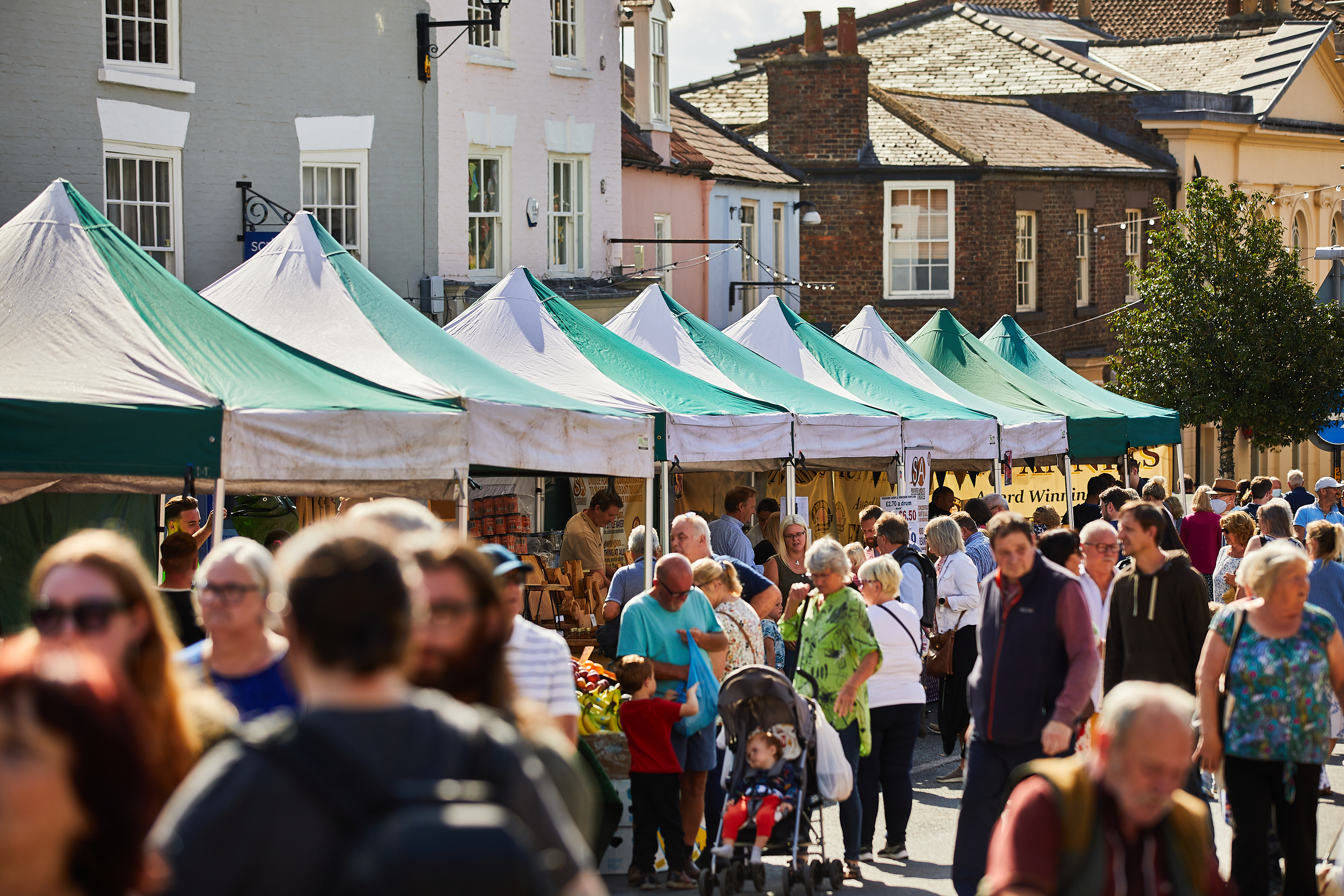 People shopping at stalls at the Malton Food Lovers Festival