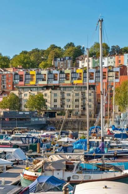 Hotwells Docks, Bristol Marina and boats with the coloured houses of Clifton Wood and Ambra Vale, Bristol, England.