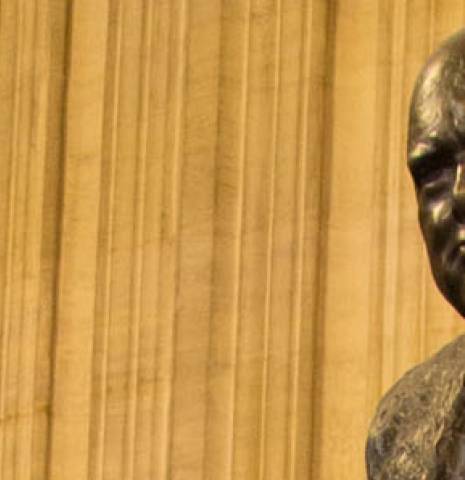 A statue of Winston Churchill in the Houses of Parliament