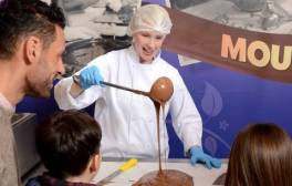 A family watching chocolate being made at Cadbury World, Birmingham.