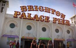 A view of the Brighton Palace Pier sign at the entrance to the pier