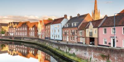 Historic town houses overlooking the river Wensum, Norwich, Norfolk, East Anglia, England.