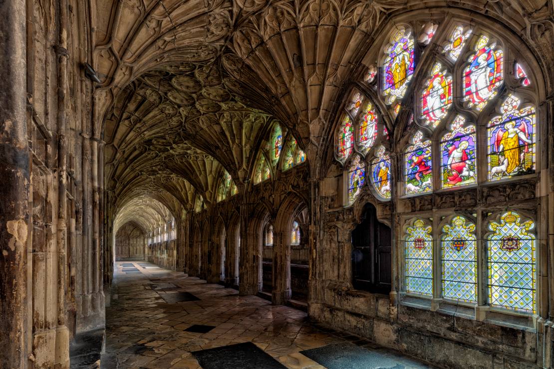 Cloisters and colourful stain-glassed windows at Gloucester Cathedral