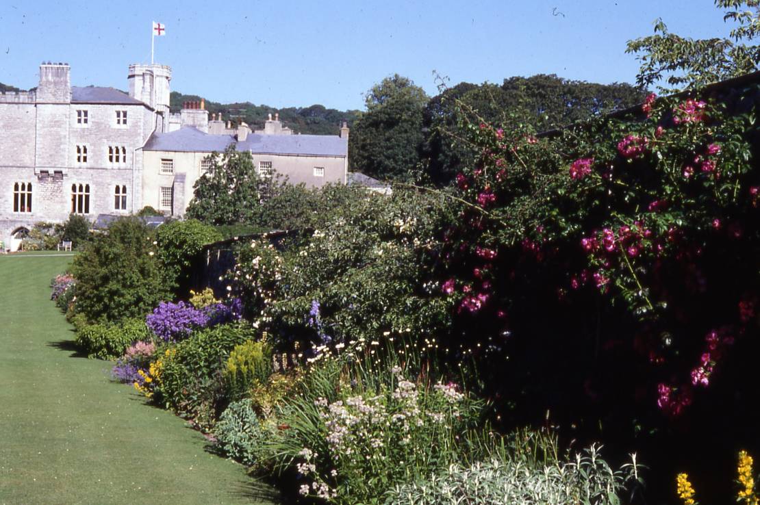 Leighton Hall with a foreground of flowers in bloom