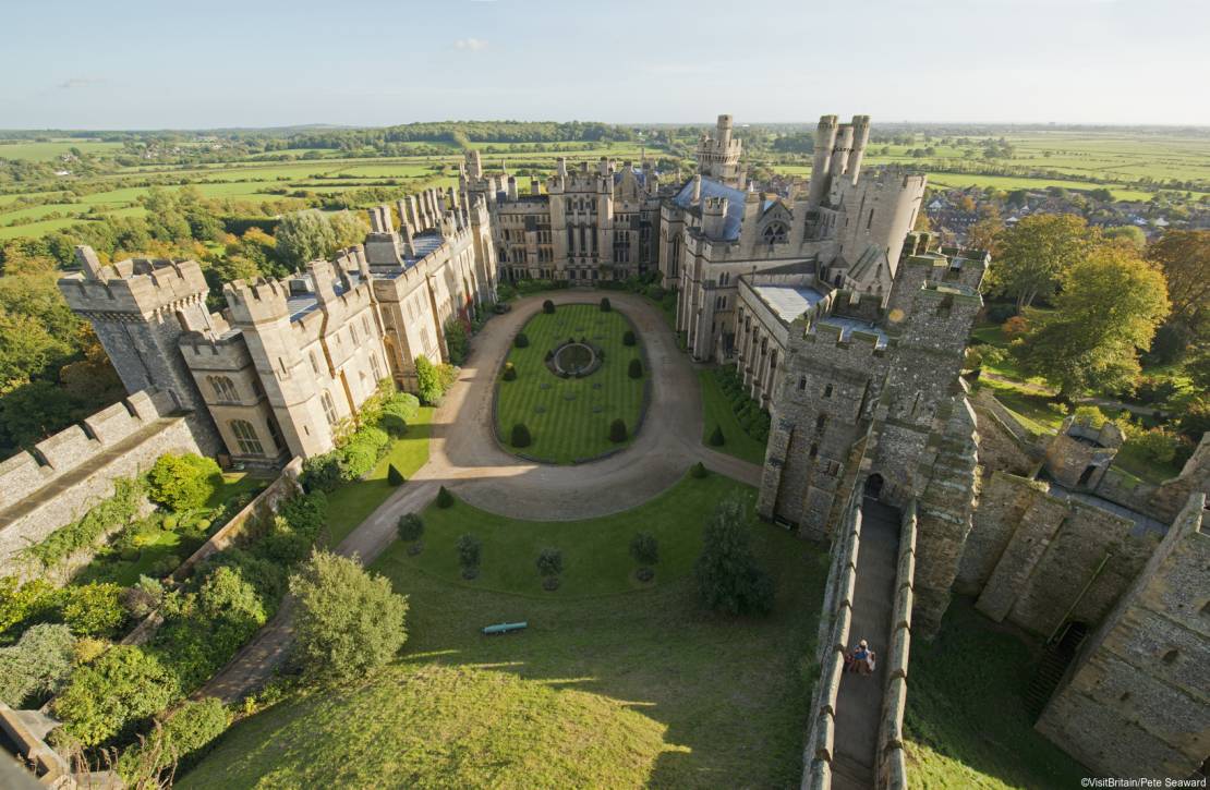 Arundel Castle is a restored medieval castle in Arundel.. View from the Norman motte, high above the castle grounds.