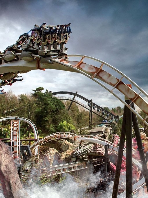 View of people on a roller coaster at Alton Towers, Staffordshire hanging upside down.