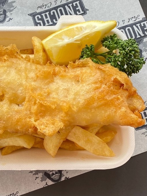 Fish and chips being served at Enochs Fish & Chips in Snowdonia/Eryri National Park
