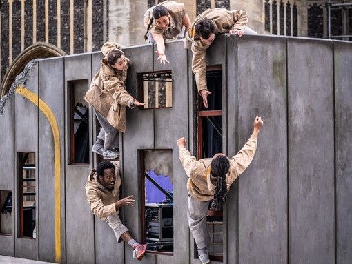 A group of performers putting on a display outside as part of Norfolk and Norwich Festival
