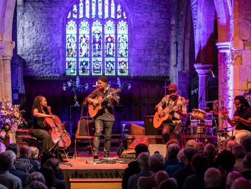Antonio Forcione Quartet on stage at St. Andrews Church in Grinton