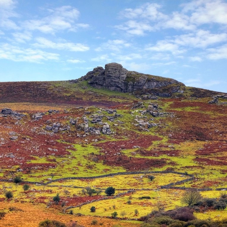 A rocky outcrop on a hill in a national park