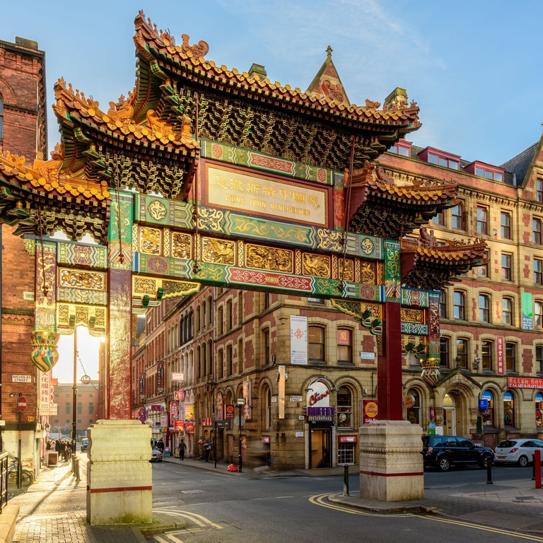 The main ornate arched entrance to a city Chinatown.